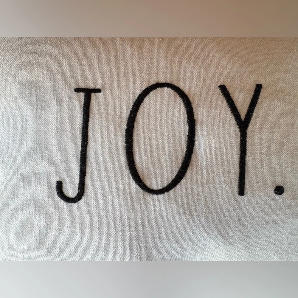 Rae Dunn. “JOY” White and Black Embroidered Throw Pillow with a Down Insert